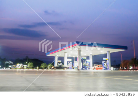 blur gas station with clouds and sky at sunset for background blur gas station with clouds and sky at sunset for background 90423959