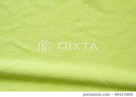 Green towel fabric texture surface close up background 90423960