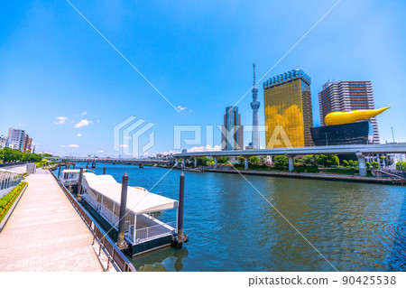 Tokyo cityscape of Japan Overlooking the Asakusa water bus boarding area and the Sumida River 90425538