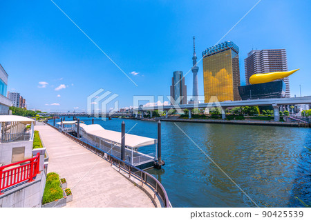 Tokyo cityscape of Japan Overlooking the Asakusa water bus boarding area and the Sumida River 90425539