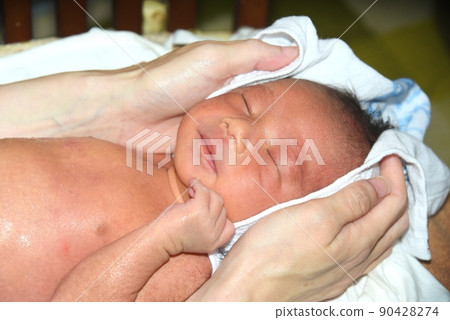 Newborn 8th day after birth after taking a bath Newborn 8th day after birth after taking a bath 90428274