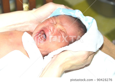 Newborn 8th day after birth after taking a bath Newborn 8th day after birth after taking a bath 90428276