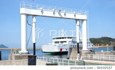Ferry entering Naoshima Miyaura Port 90430587