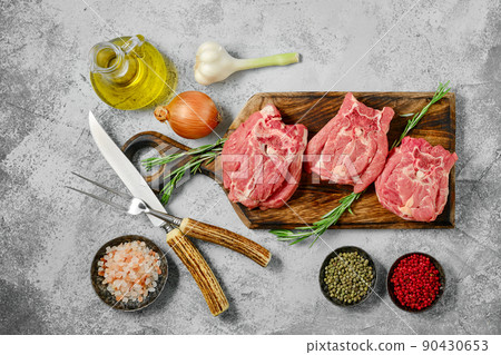 Raw lamb neck cut on slices, top view Raw lamb neck cut on slices, top view 90430653