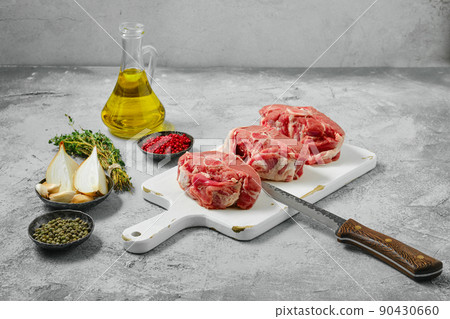 Uncooked raw lamb loin chops saddle steaks 90430660