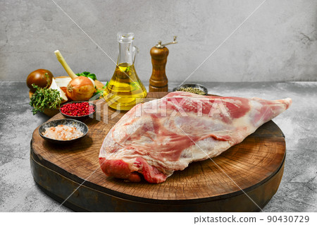 Raw lamb leg chump on with ingredients 90430729