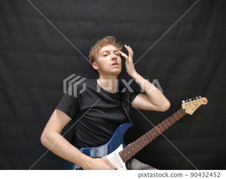 Man playing guitar Man playing guitar 90432452