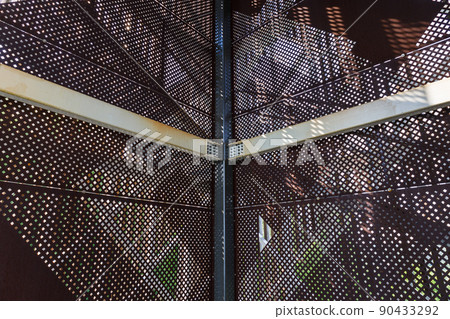 Massive industrial steel construction with rusty steel plates 90433292