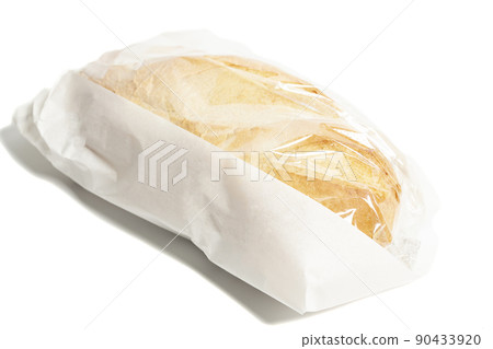 White bread in a paper bag isolated on white background 90433920
