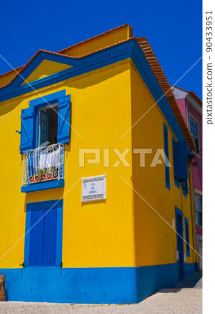 Beautiful portugal multicolored yellow and blue house Beautiful portugal multicolored yellow and blue house 90433951