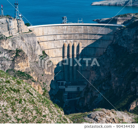 view of large arch dam in the canyon, Chirkey hydroelectric power station 90434430