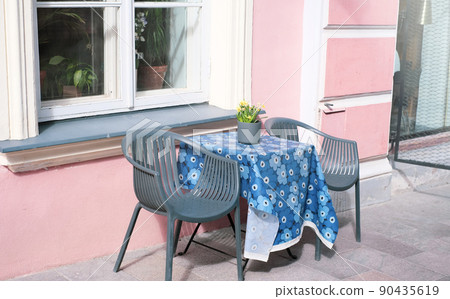 Summer terrace of the restaurant on a clear day. Table near the restaurant close-up 90435619