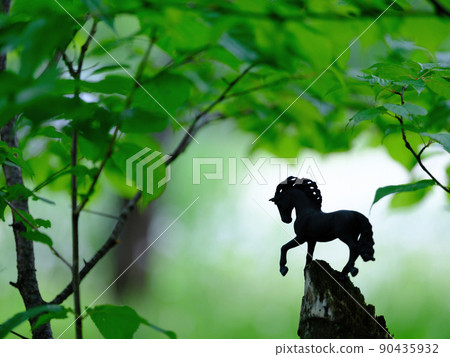 Green and horse figure Green and horse figure 90435932