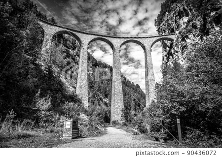 Landwasser Viaduct in Switzerland. Scenic high bridge, landmark of Swiss Alps Landwasser Viaduct in Switzerland. Scenic high bridge, landmark of Swiss Alps 90436072