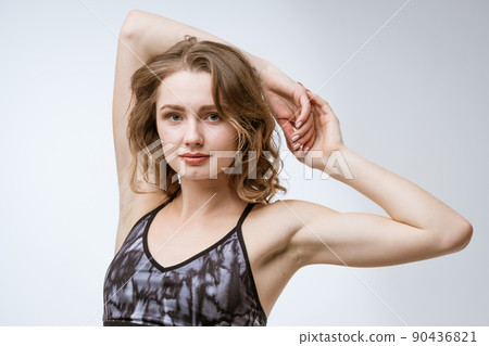 portrait of a young woman in a training uniform portrait of a young woman in a training uniform 90436821