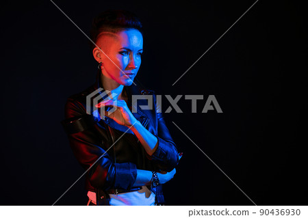 Fashion portrait of caucasian woman with creative lighting with smiling face Fashion portrait of caucasian woman with creative lighting with smiling face 90436930