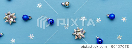 New year or winter composition. Pattern of white and blue balls and snowflakes New year or winter composition. Pattern of white and blue balls and snowflakes 90437078