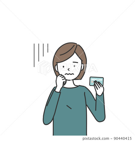 A woman with a troubled face holding a credit card A woman with a troubled face holding a credit card 90440415