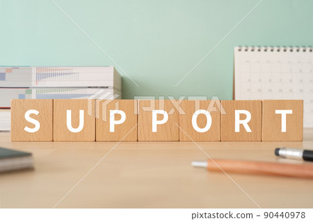 Image of support | Desk with a block labeled "SUPPORT" 90440978