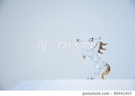 White background with crystal horses White background with crystal horses 90441407