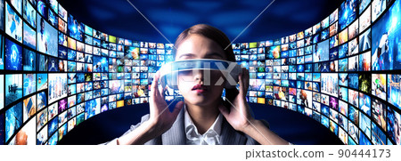 Women watching VR images VR goggles Horizontal visual for banners and advertisements Women watching VR images VR goggles Horizontal visual for banners and advertisements 90444173