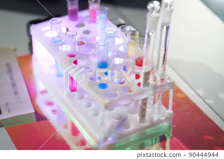 A set of laboratory utensils for medical or scientific research. A beaker with chemicals. Laboratory glass equipment, test tubes and flasks. High quality photo A set of laboratory utensils for medical or scientific research. A beaker with chemicals. Laboratory glass equipment, test tubes and flasks. High quality photo 90444944