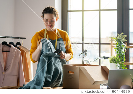 Woman is working at workshop 90444959