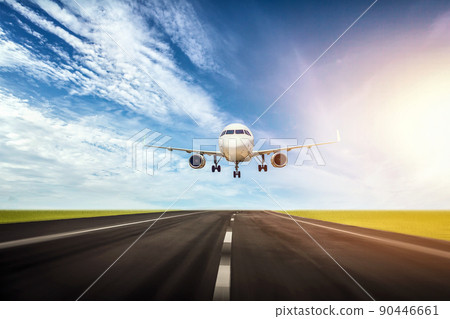 Runway at the airport and the plane and landing. Runway at the airport and the plane and landing. 90446661