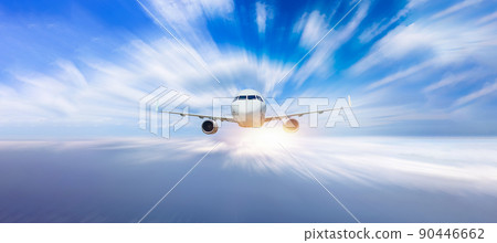White passenger airplane flying in the sky. Travel by air transport White passenger airplane flying in the sky. Travel by air transport 90446662