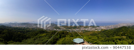 A panoramic view of the Kurushima Kaikyo Bridge (Imabari City, Ehime Prefecture) and the surrounding natural scenery, as seen from near the Chikamiyama Observatory. A panoramic view of the Kurushima Kaikyo Bridge (Imabari City, Ehime Prefecture) and the surrounding natural scenery, as seen from near the Chikamiyama Observatory. 90447538