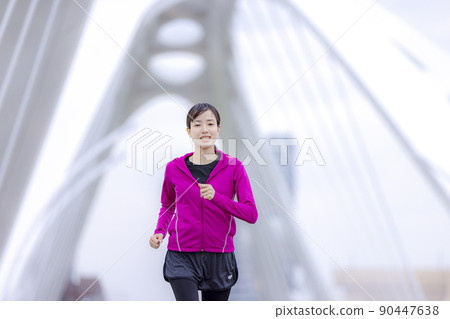 Young women jogging Young women jogging 90447638