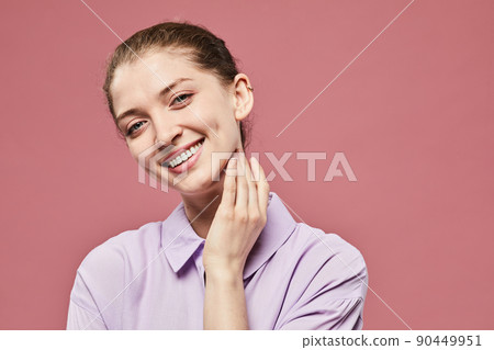 Portrait of Smiling Young Woman on Pink Portrait of Smiling Young Woman on Pink 90449951