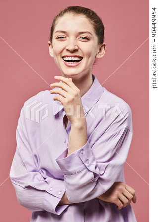 Young Woman Laughing on Pink Young Woman Laughing on Pink 90449954
