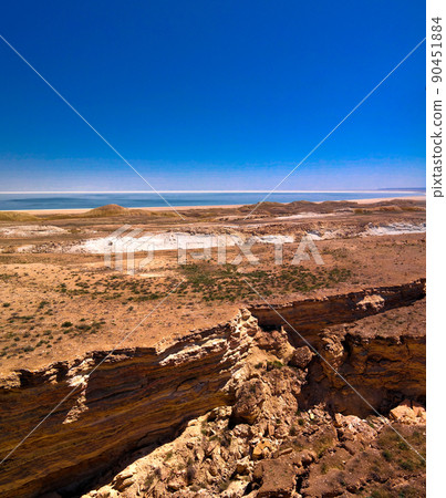 Panorama view to Aral sea from the rim of Plateau Ustyurt near Duana cape , Karakalpakstan, Uzbekistan Panorama view to Aral sea from the rim of Plateau Ustyurt near Duana cape , Karakalpakstan, Uzbekistan 90451884