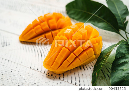 mango fruit,fresh yellow mango on white wood 90453523