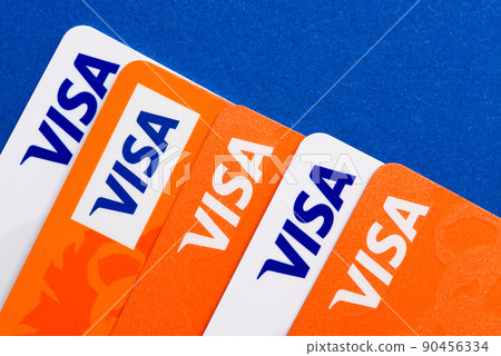 Row of Visa plastic credit payment cards top view 90456334