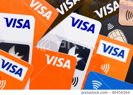 Visa plastic credit payment cards with contactless pay symbol top view 90456364