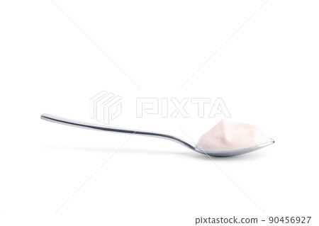 Spoon with tasty organic yogurt isolated on white 90456927