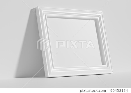 Horizontal rectangular photo frame on floor leaning at wall diagonal view 90458154