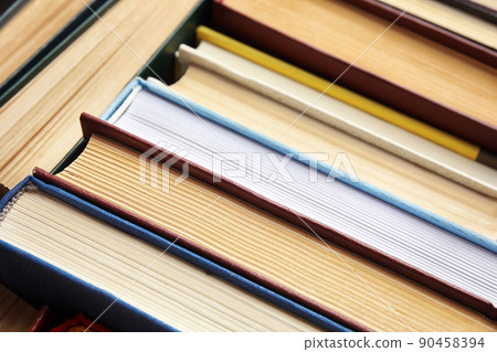 Many different hardcover books as background, closeup 90458394