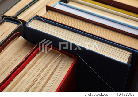 Many different hardcover books as background, closeup Many different hardcover books as background, closeup 90458395