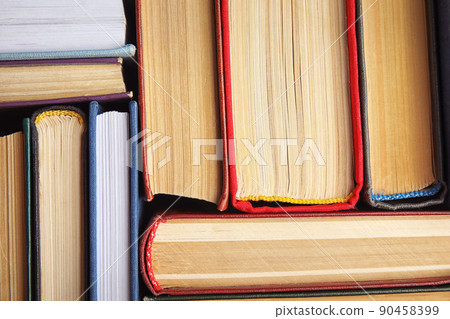 Many different hardcover books as background, top view Many different hardcover books as background, top view 90458399