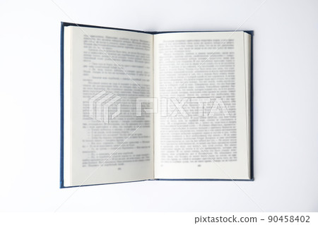 Open book on white background, top view 90458402
