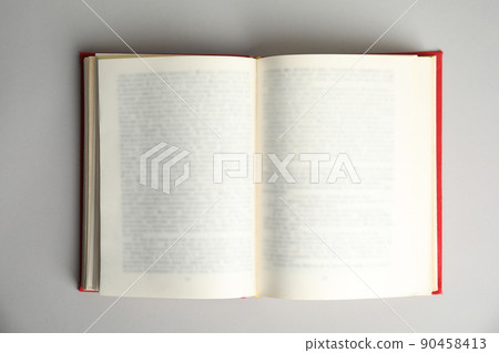 Open book on light grey background, top view. Space for text 90458413