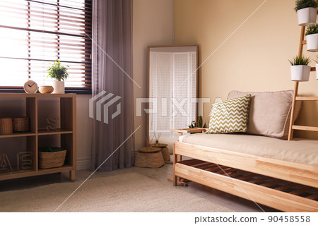 Large stylish mirror in contemporary room interior 90458558