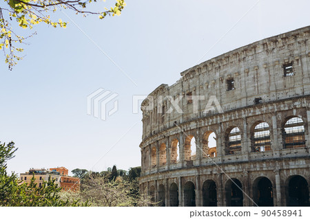 Great Roman Colosseum, Coliseum, Colosseo, also known as the Flavian Amphitheatre. Famous world landmark. Scenic urban landscape. Rome, Italy. Web banner Great Roman Colosseum, Coliseum, Colosseo, also known as the Flavian Amphitheatre. Famous world landmark. Scenic urban landscape. Rome, Italy. Web banner 90458941