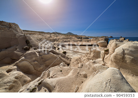 Famous white rocks of Sarakiniko beach, Aegean sea, Milos island , Greece. No people, empty cliffs, summer sunshine, clear blue sky 90459353