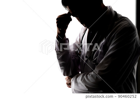 Medical image Male silhouette in a white coat Medical image Male silhouette in a white coat 90460252