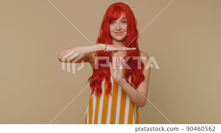 Tired serious upset girl showing time out gesture limit stop break sign no pressure I need more time 90460562