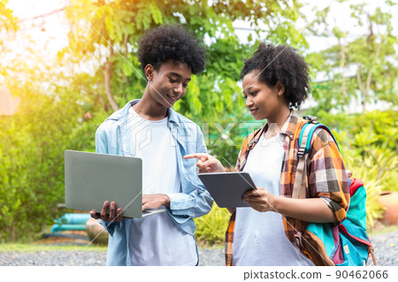 Two students in school and working on laptop 90462066